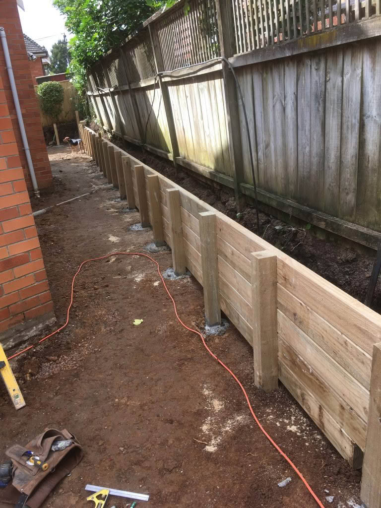 example of a timber retaining wall constructed by Concrete Works Auckland